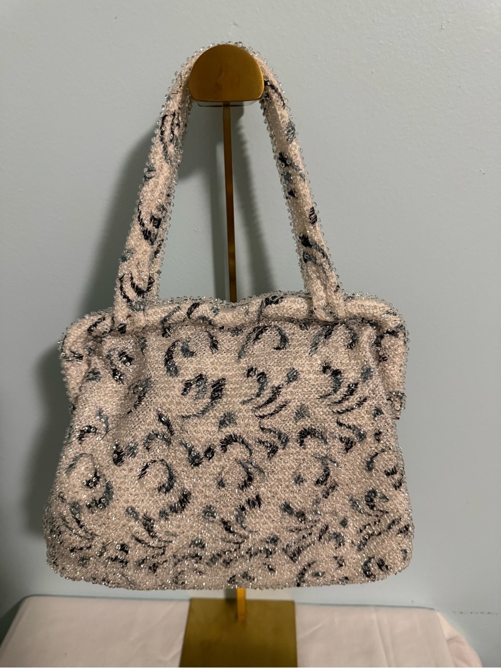 Ivory Sequin “Corde’ Beade” Bag with light and dark hues of Blue decoration.
